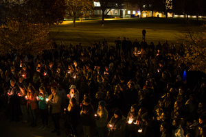 About 300 Syracuse University and  the State University of New York College of Environmental Science and Forestry students gathered in front of Hendricks Chapel for a candlelight vigil following the Election Day results. 