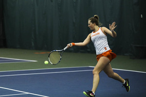 Gabriela Knutson smacks a forehand in recent game action. The SU sophomore beat the No. 14-ranked singles player on Sunday afternoon in a Syracuse win. 